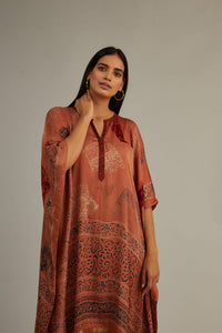 Peach Hand blocked Ajrakh Kaftan with Tassels.