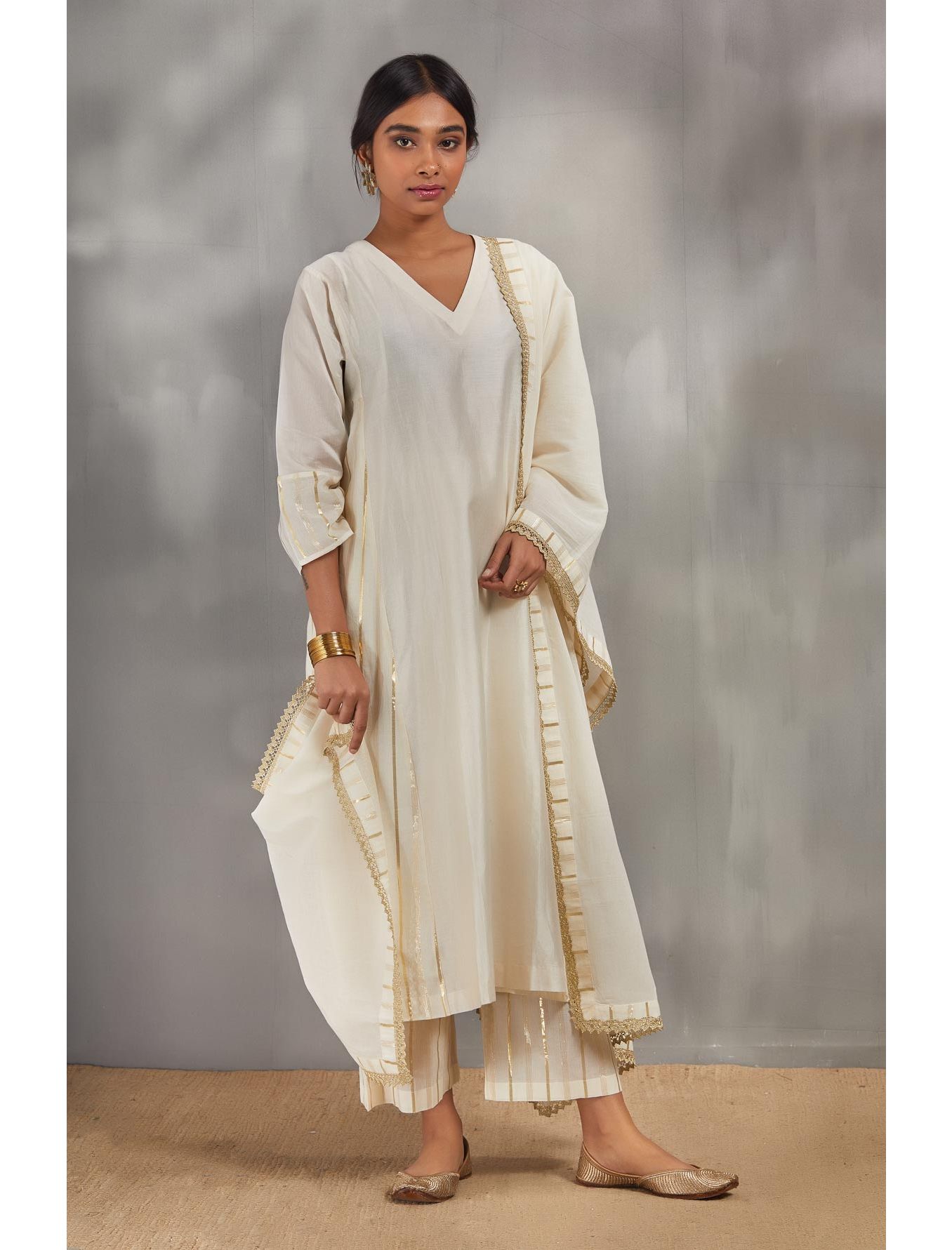 Ivory Silk Chanderi Kali Kurta Set With Zari Striped Pants And Dupatta.