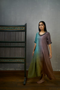 Mauve Blue Asymmetric Dupion Silk Ombre Kurta With Embroidered Cluster Of Potlis Around Neckline .